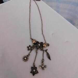 Ladies Pilgrim Necklace done in black, brass and amber coloring